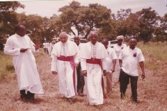 Fr. Peter Dakura, the Nuncio Archbishop George Kocherry, Bishop Paul Bemile (Emeritus now), Mr. Baarekoh and some parishioners of St. Benedict parish: on the way to the new site of the parish